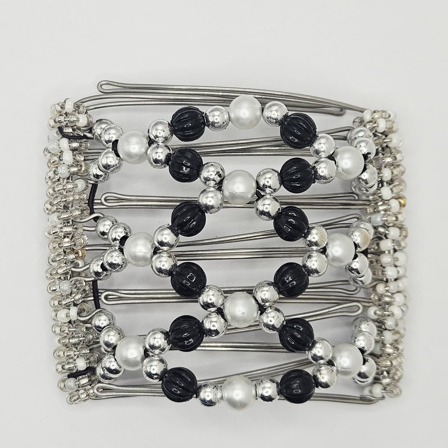 7 Tooth medium Hair comb, Black and silver dressy design