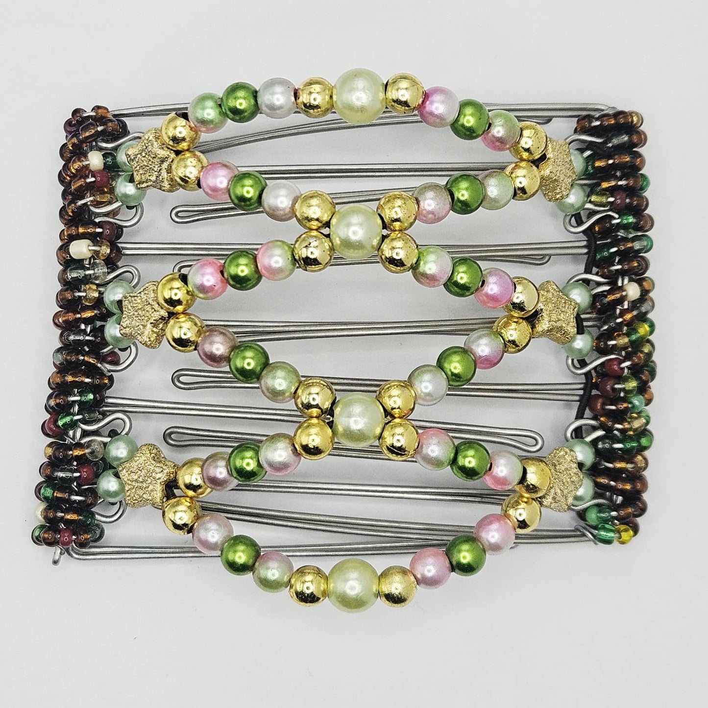 7 Tooth medium Hair comb, Shiney and whimsical, golds ,greens, pinks, golden stars