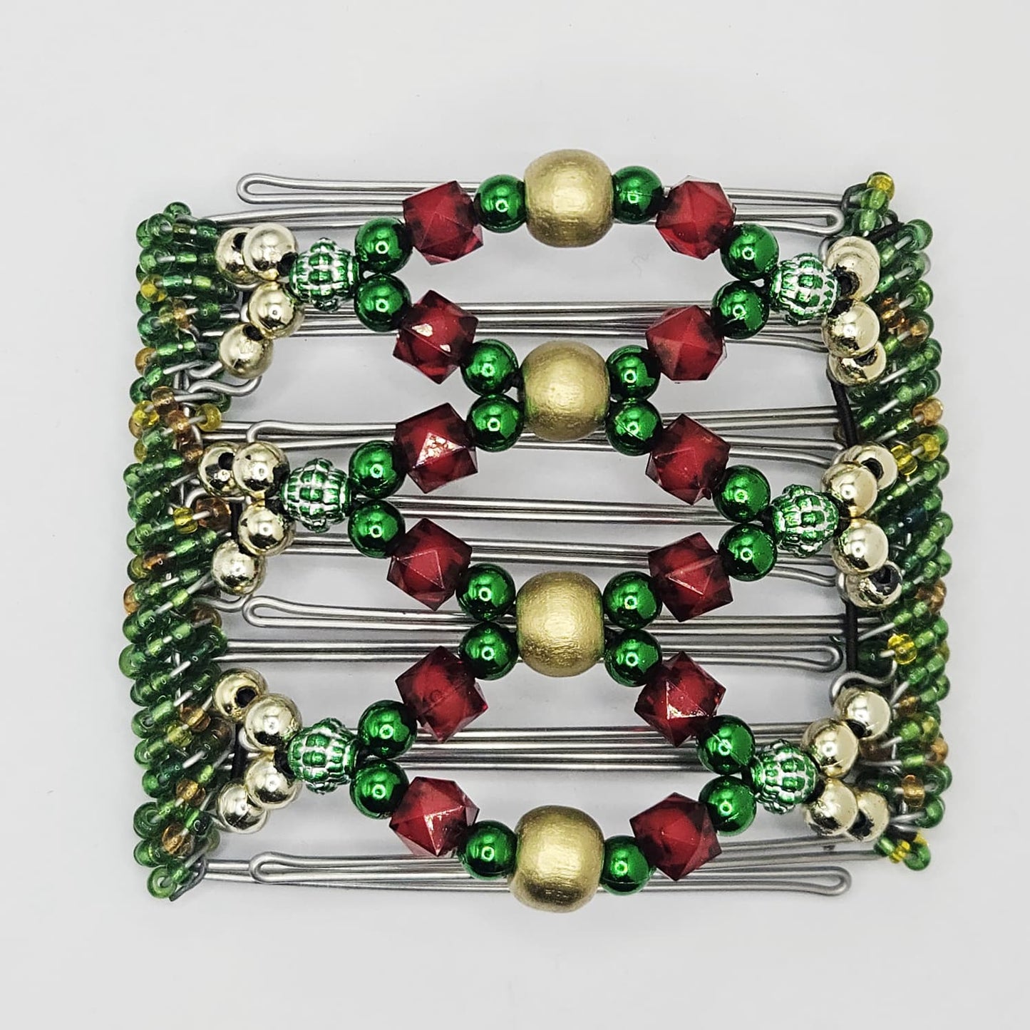 7 Tooth medium Hair comb, Christmas colors , golds, greens, reds!!!