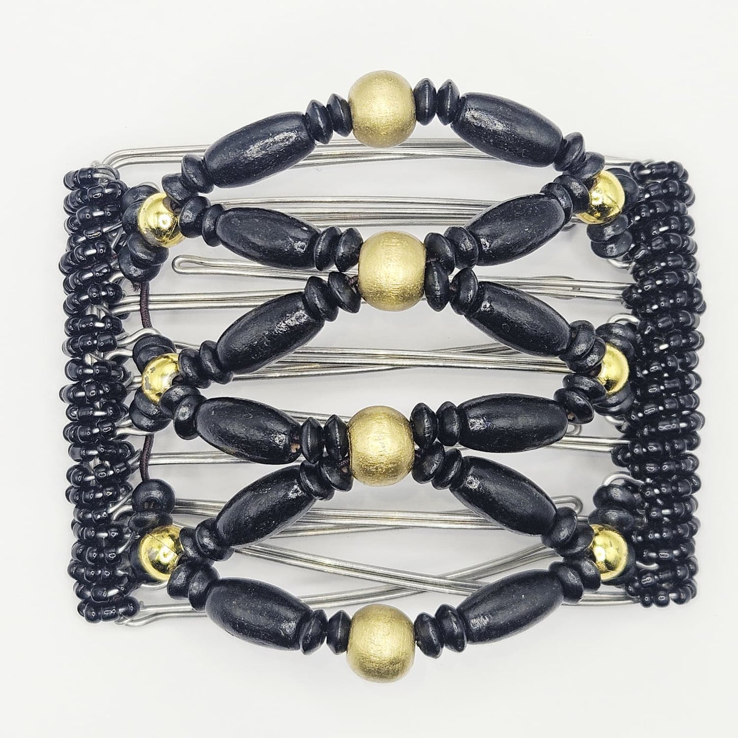 7 Tooth medium Hair comb, Black and gold tone wooden dressy design