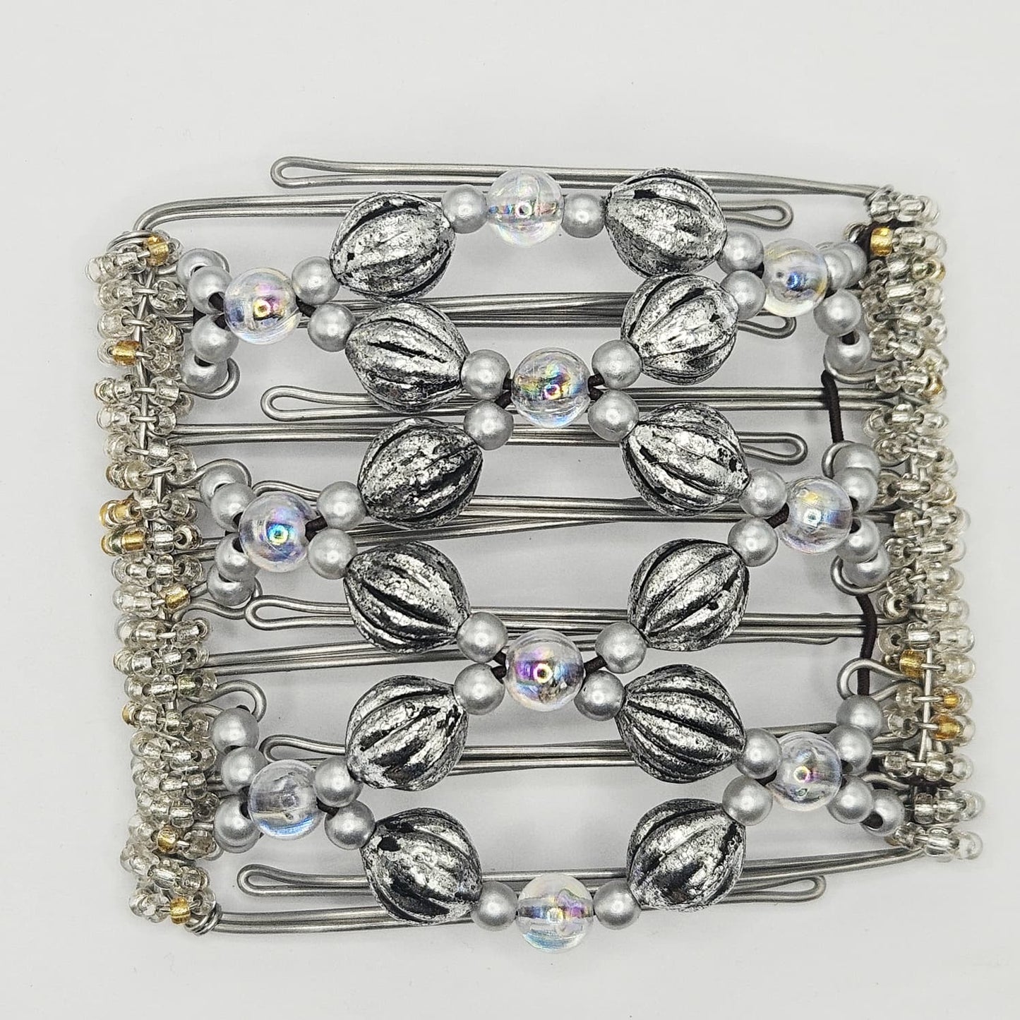 7-Tooth Medium hair comb, Silver tone ornate design