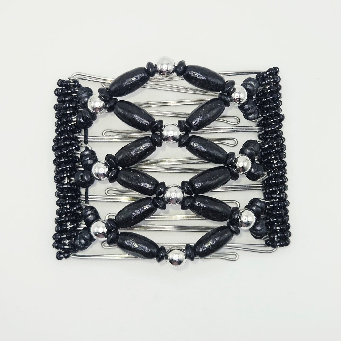 7 Tooth medium Hair comb, Black and Silver tone wooden dressy design