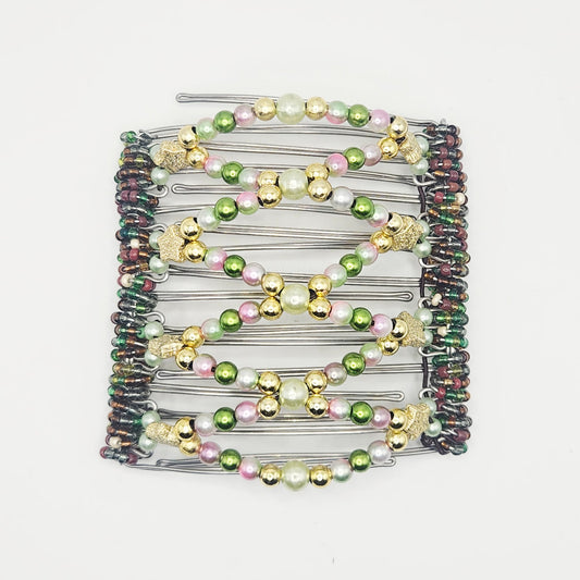 9 Tooth Large hair comb by The Hair Jeweler Inc., Shiney and whimsical, golds ,greens, pinks, golden stars