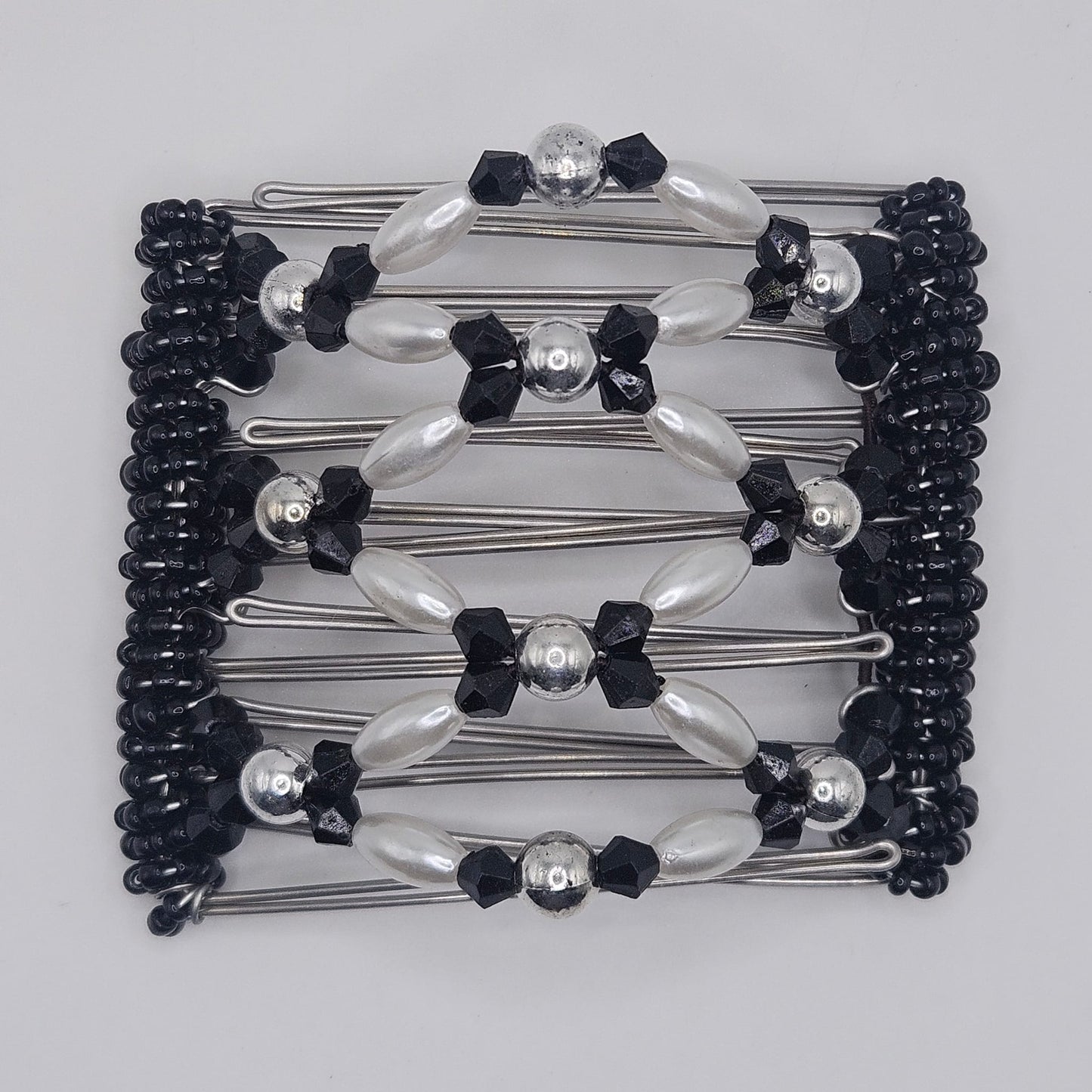 7 Tooth Medium Hair comb by The Hair Jeweler Inc. Silver, Black and white dressy